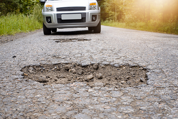 How Can Potholes Damage Your Car? | Fox Run Auto